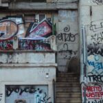 Art Neighborhoods - Exterior of shabby building with graffiti