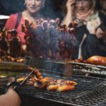 Street Food - People Watching Barbecues Getting Cooked