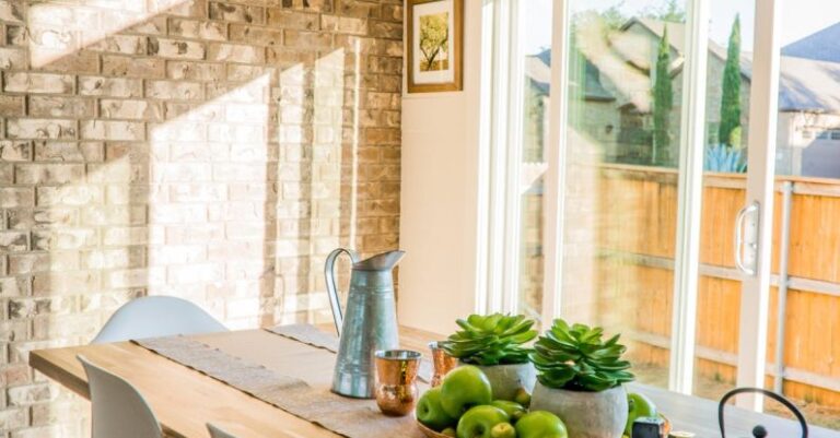 Luxury Items - Black Kettle Beside Condiment Shakers and Green Fruits and Plants on Tray on Brown Wooden Table