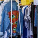 Shopping Secrets - A rack of clothes with different colored jackets
